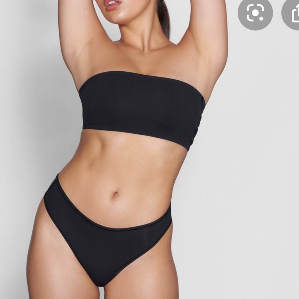 2 SKIMS black strapless bandeau bra in Onyx